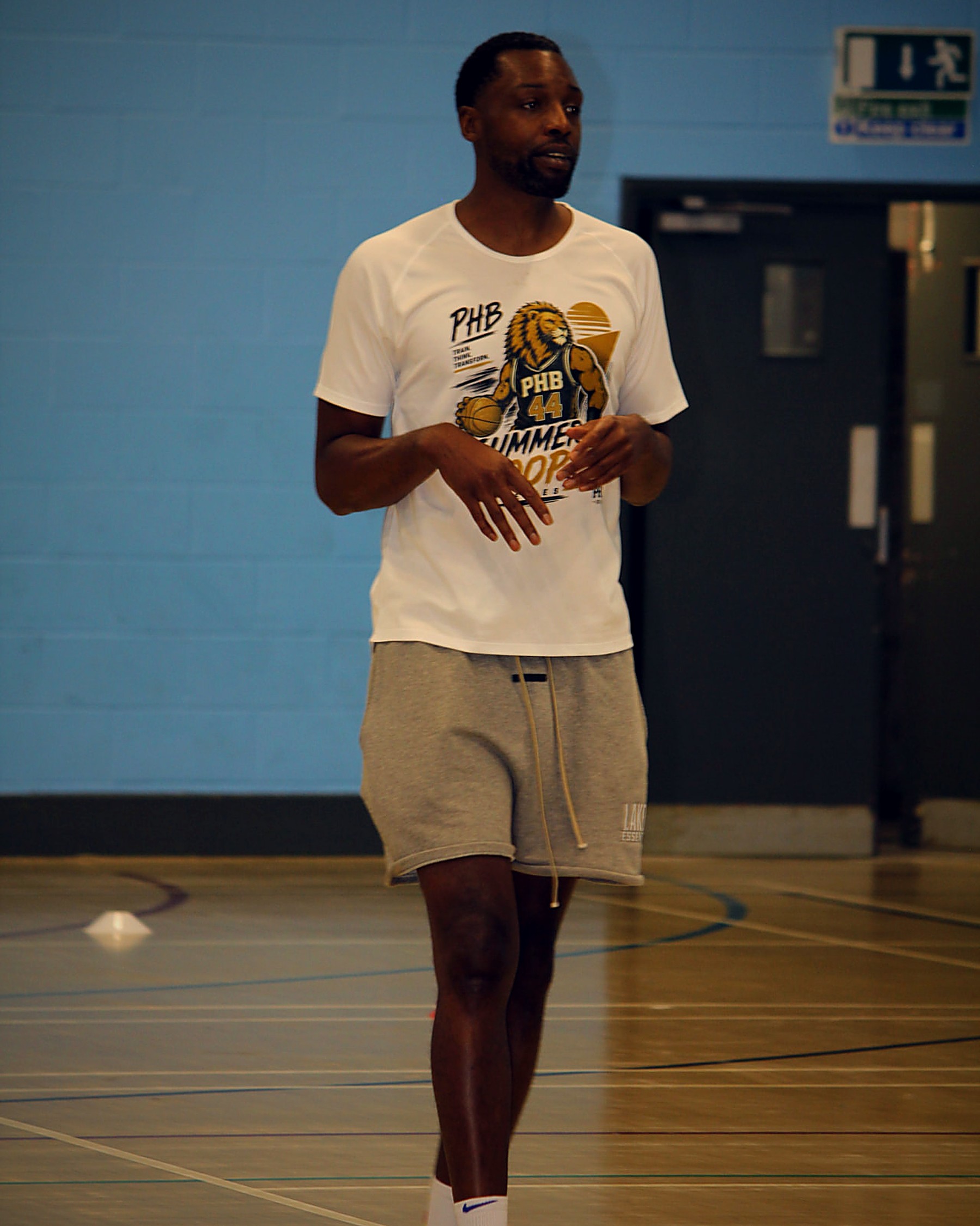 Coach Shane Walker leading a Pro Hoops Blueprint session in a sports hall